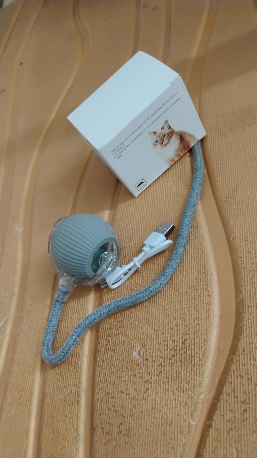 Rechargeable Interactive Cat Toy Ball with Detachable Braided Tail and LED Light (1 Pc) Rechargeable Interactive Cat Toy Ball with Detachable Braided Tail and LED Light (1 Pc)